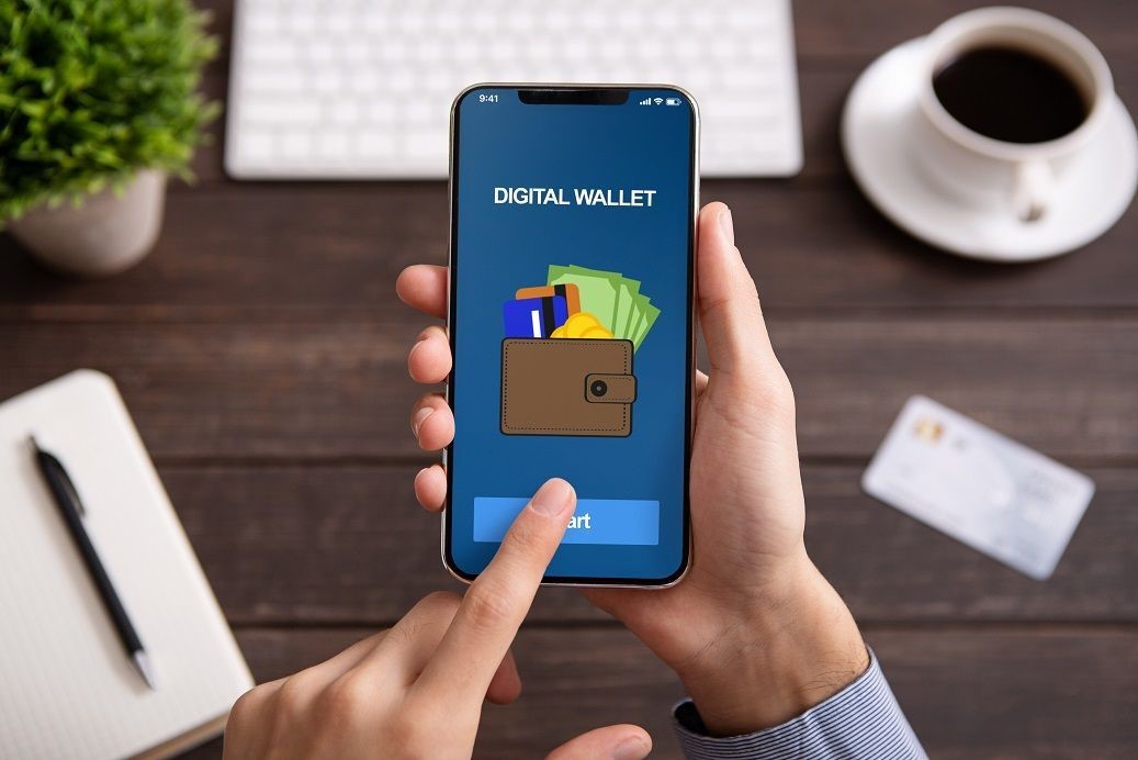 Woman paying with her phone