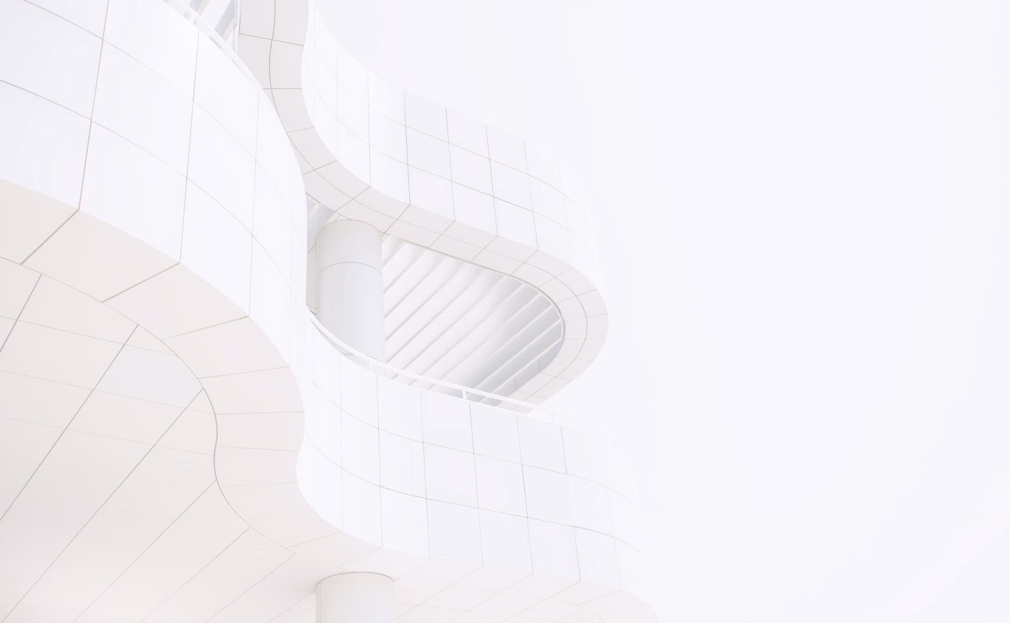 Curvy white building in a bright sunny light